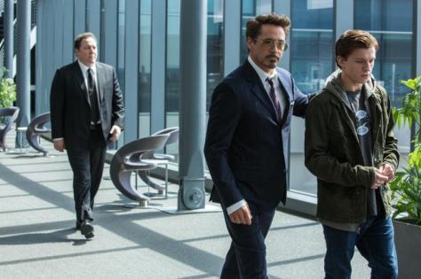 Jon Favreau, Robert Downey Jr., and Tom Holland in Spider-Man: Homecoming